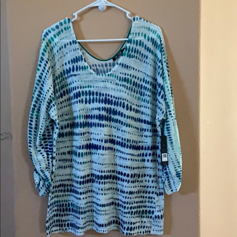 Beautiful multi color top. Never worn.